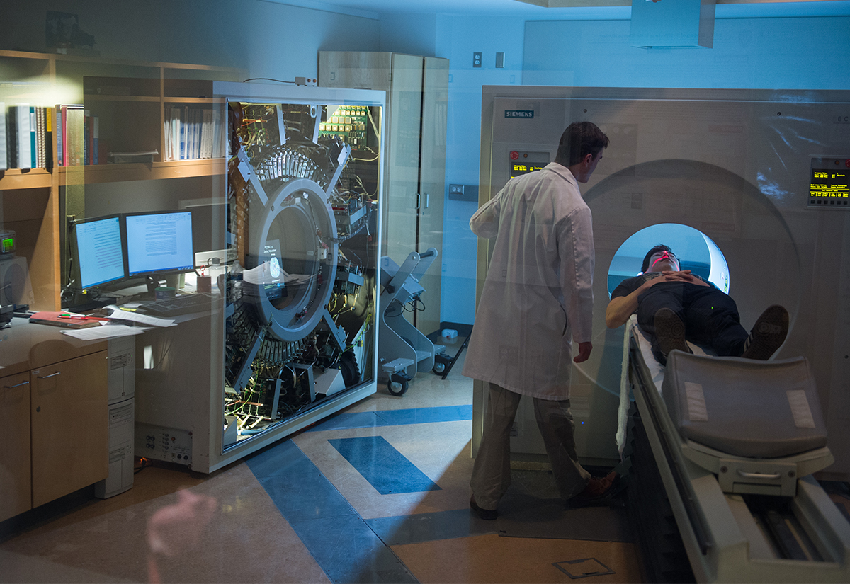 Medical professional performing a brain scan